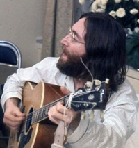200px-JohnLennon real.jpg